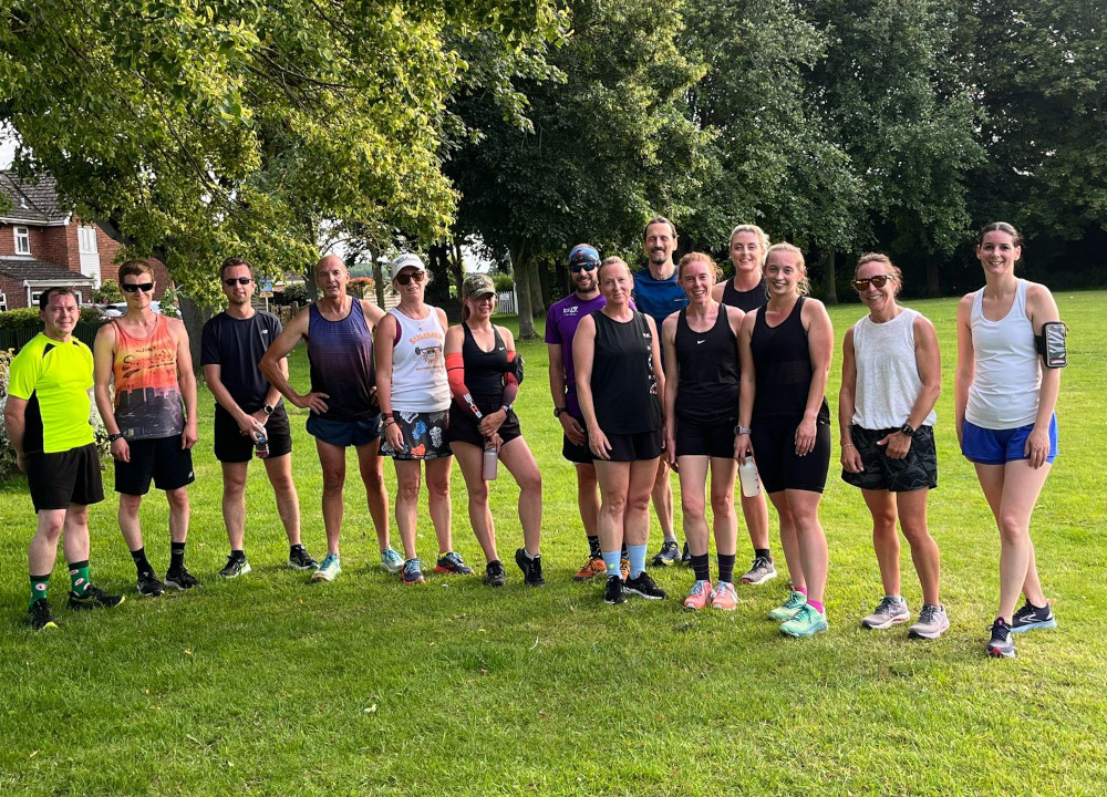 A group of runners before a social run